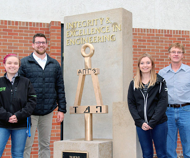 Members standing with Bent.