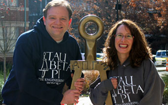 Sherry Jennings-King and Curt Gomulinski posing with the Bent.