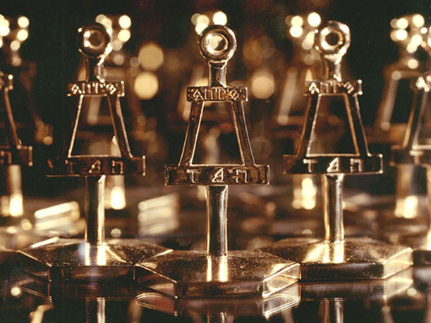 Small Bent statues in a row.